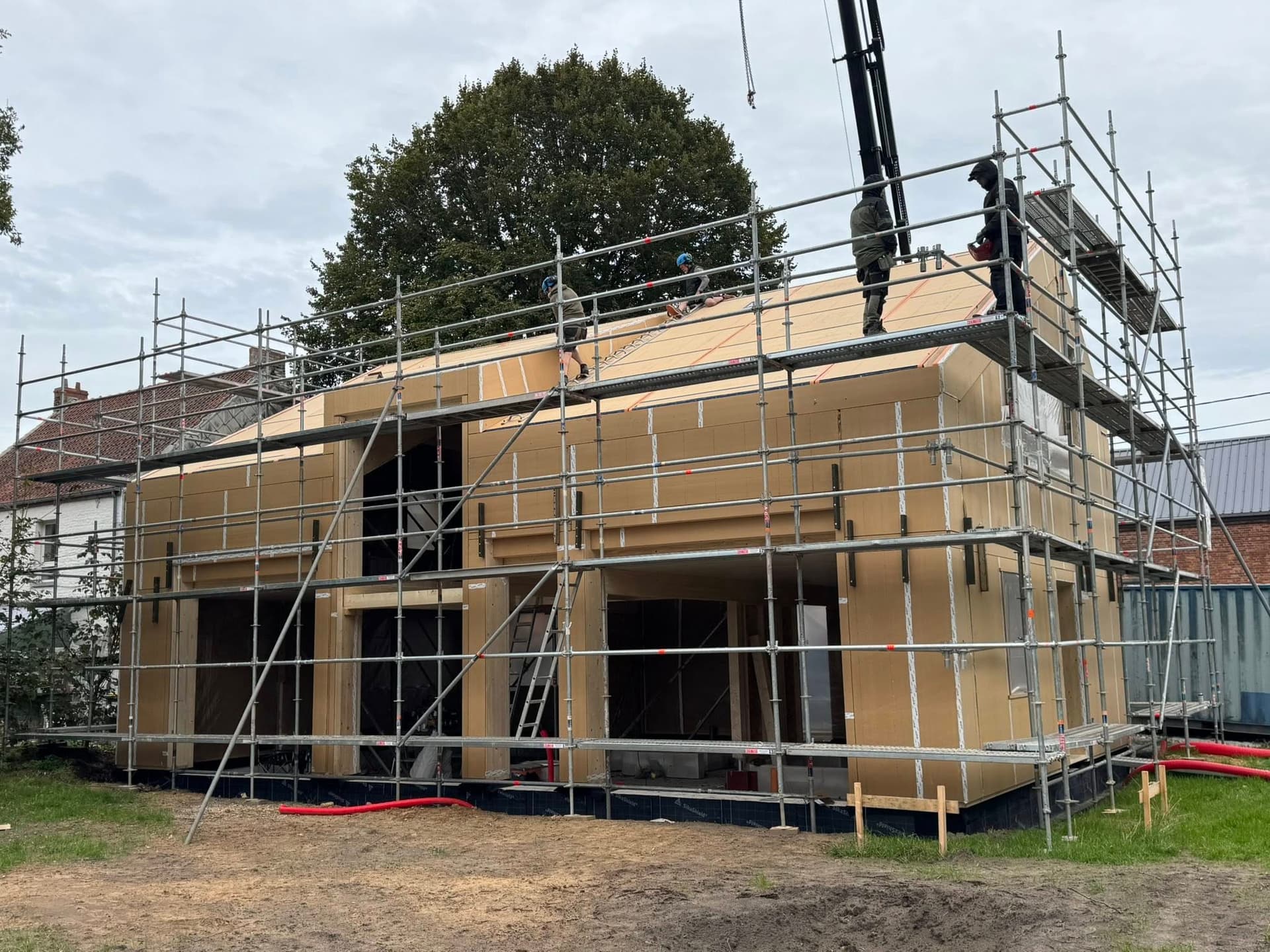 Chantier construction paille et ossature bois biosourcée